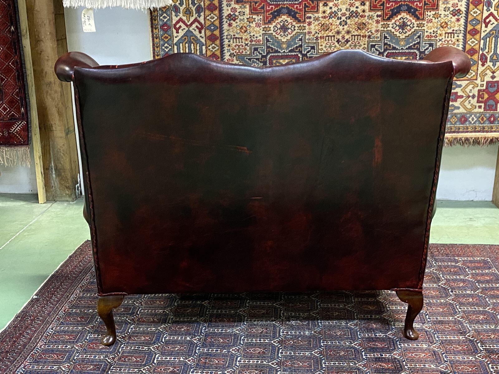 Chesterfield 2-seater leather-eared sofa from the 80s
