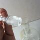 Old enamelled decanter, flower decoration, Legras