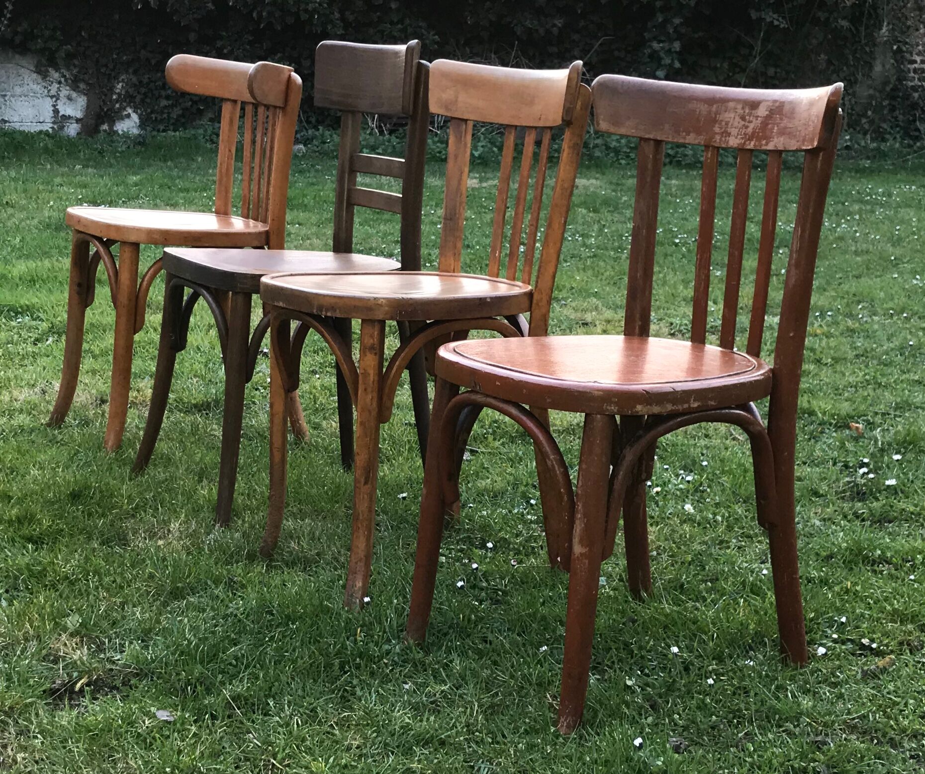 Series of 4 mismatched bistro chairs