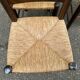 4 solid oak chairs in dark colour with elephant upholstery.