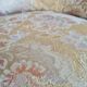 Antique flowered toad armchair with fringes