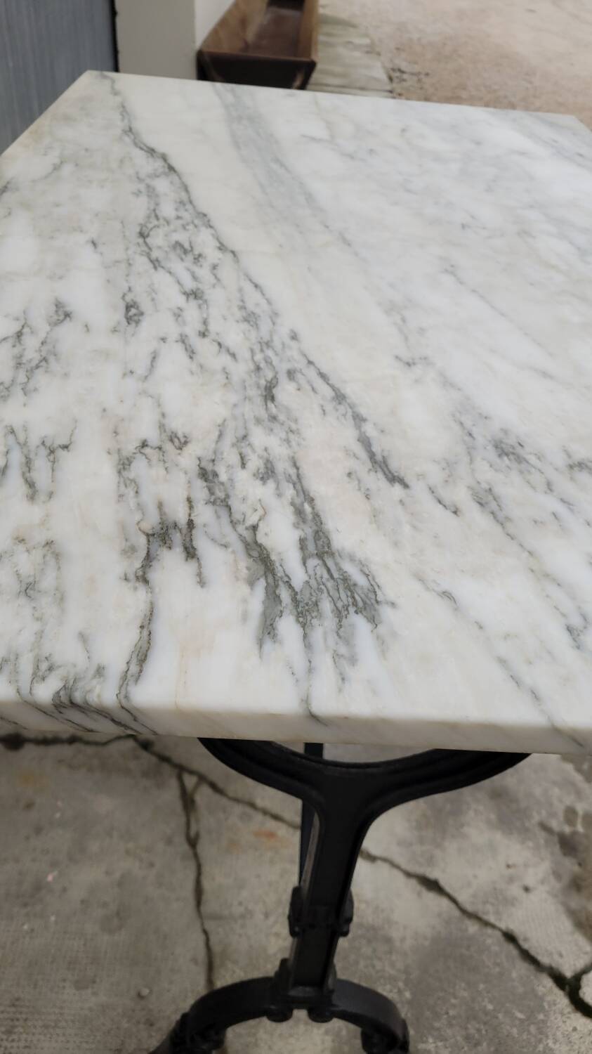 Marble and cast iron restaurant bistro table