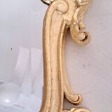 Wooden and gilded mirror with gold leaf
