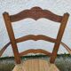 Pair of provencal straw armchairs in walnut