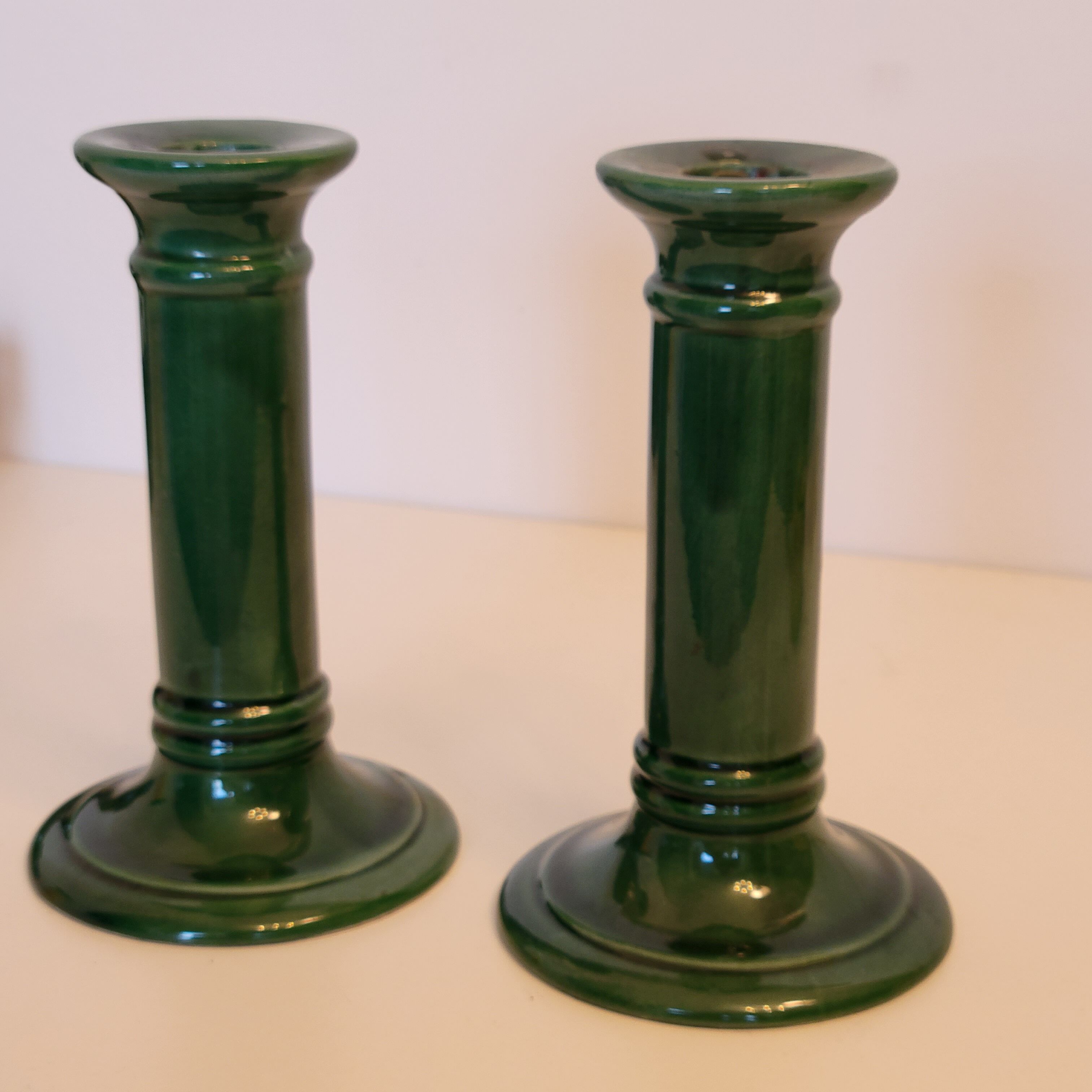 Pair of green ceramic candle holders