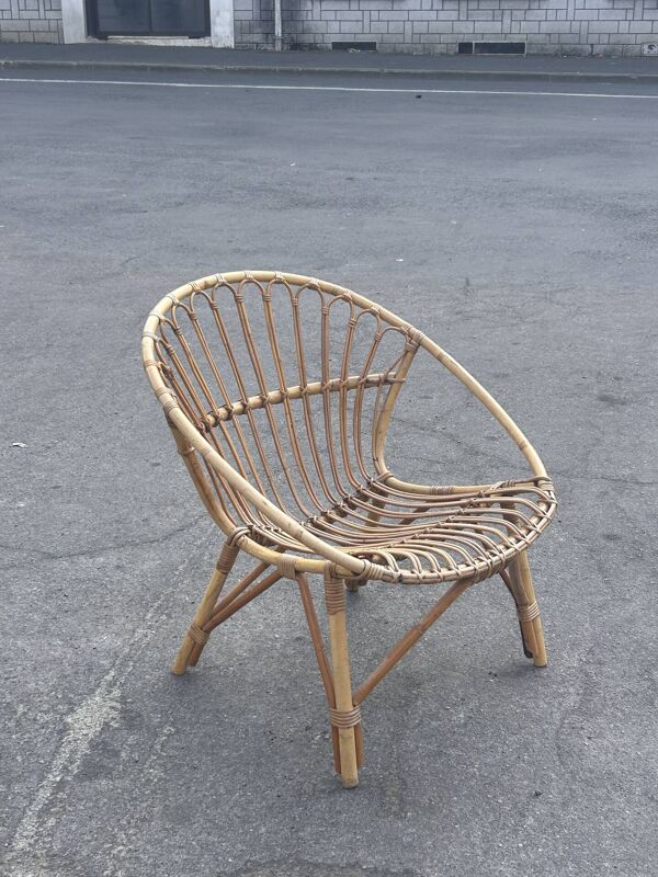 Fauteuil coquille en rotin vintage années 60 – une icône du design boh