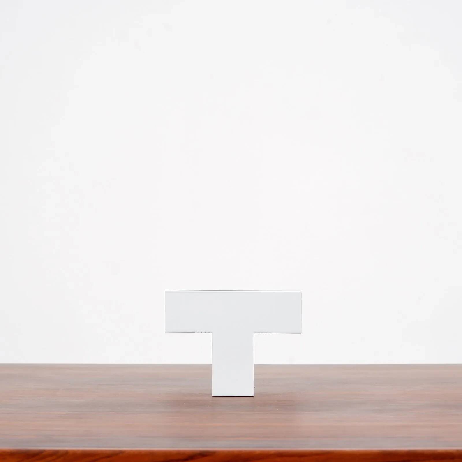 “Tight light” wall lamps by Piero Lissoni for Flos