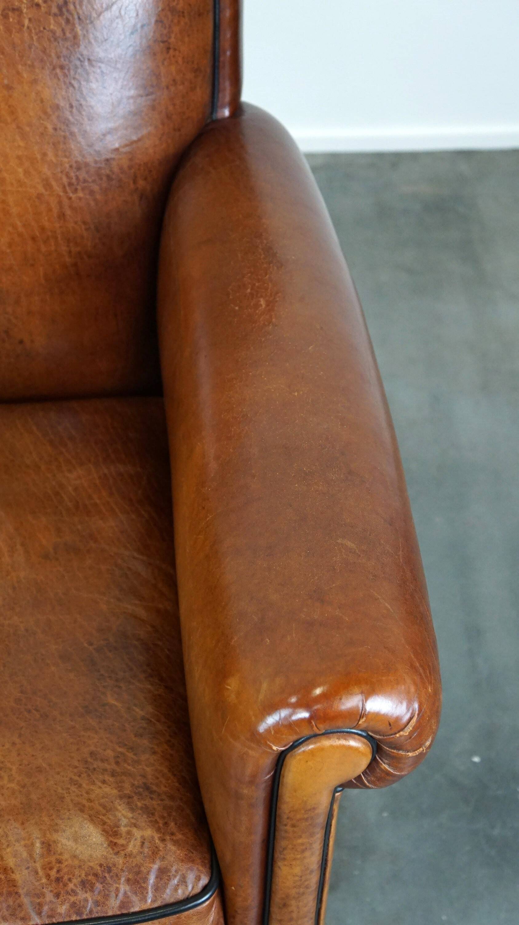 Vintage sheep leather armchair/design armchair with a beautiful look