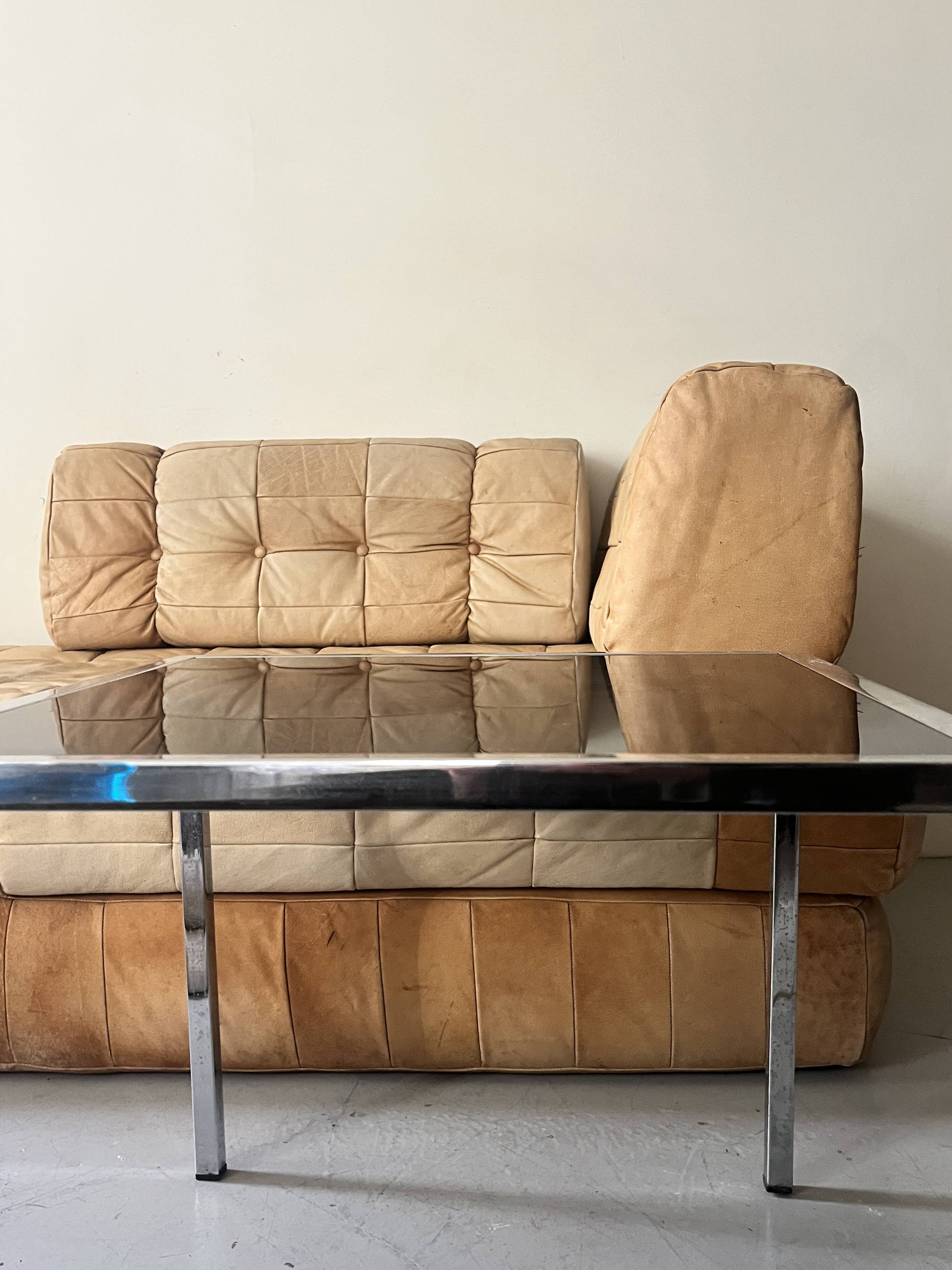 square coffee table in chrome and black glass, design