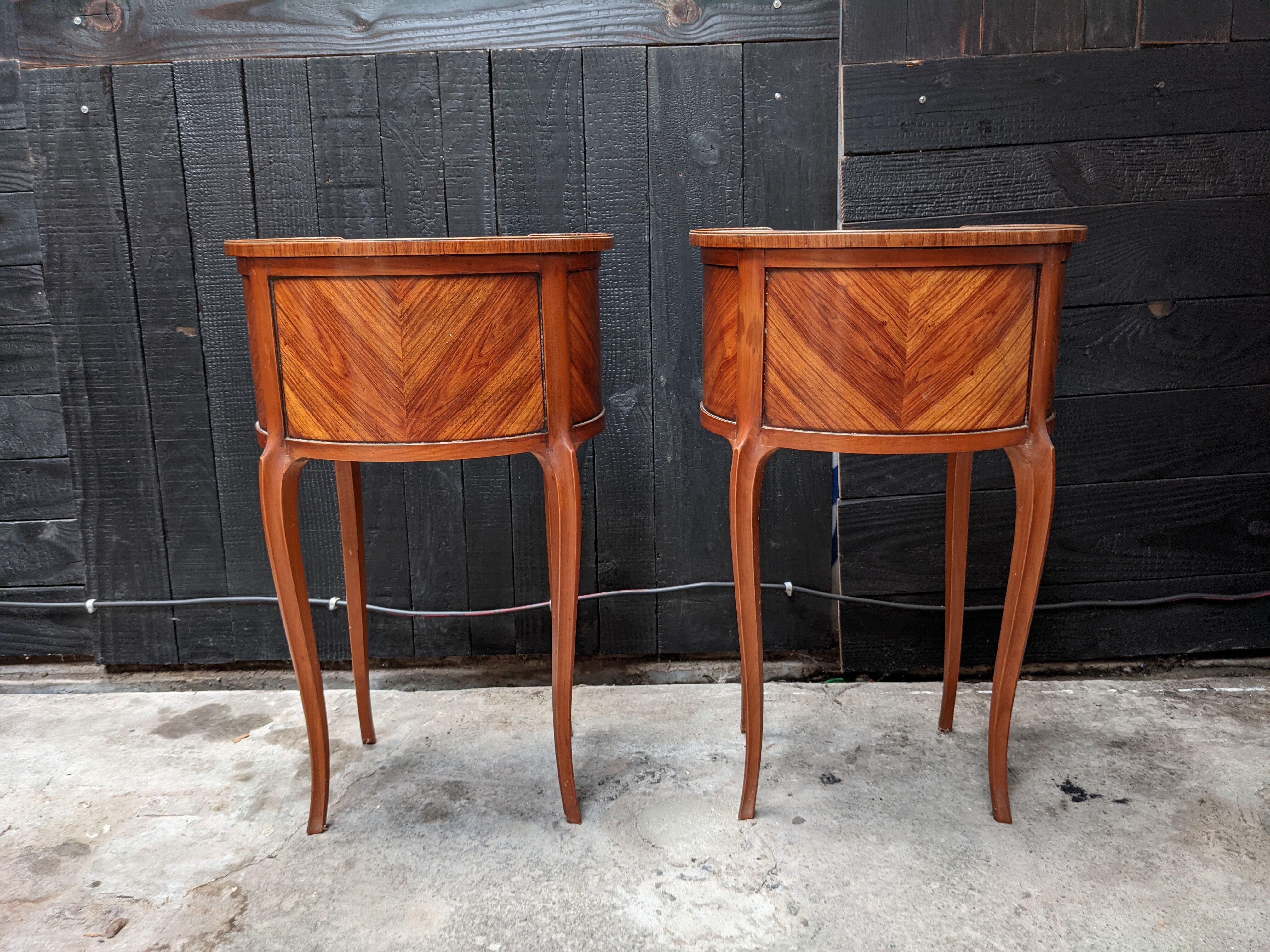 Pair of kidney bedside tables