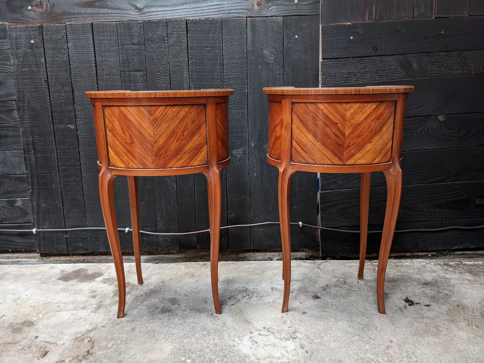 Pair of kidney bedside tables