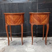 Pair of kidney bedside tables
