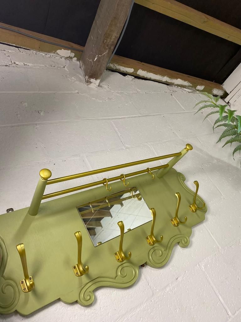Vintage olive green wall coat rack with mirror