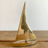 Golden brass sailboat