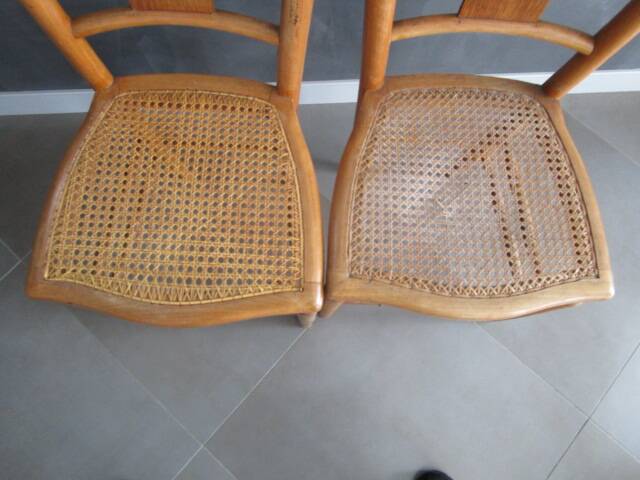 Pair of old caned chairs in blond wood