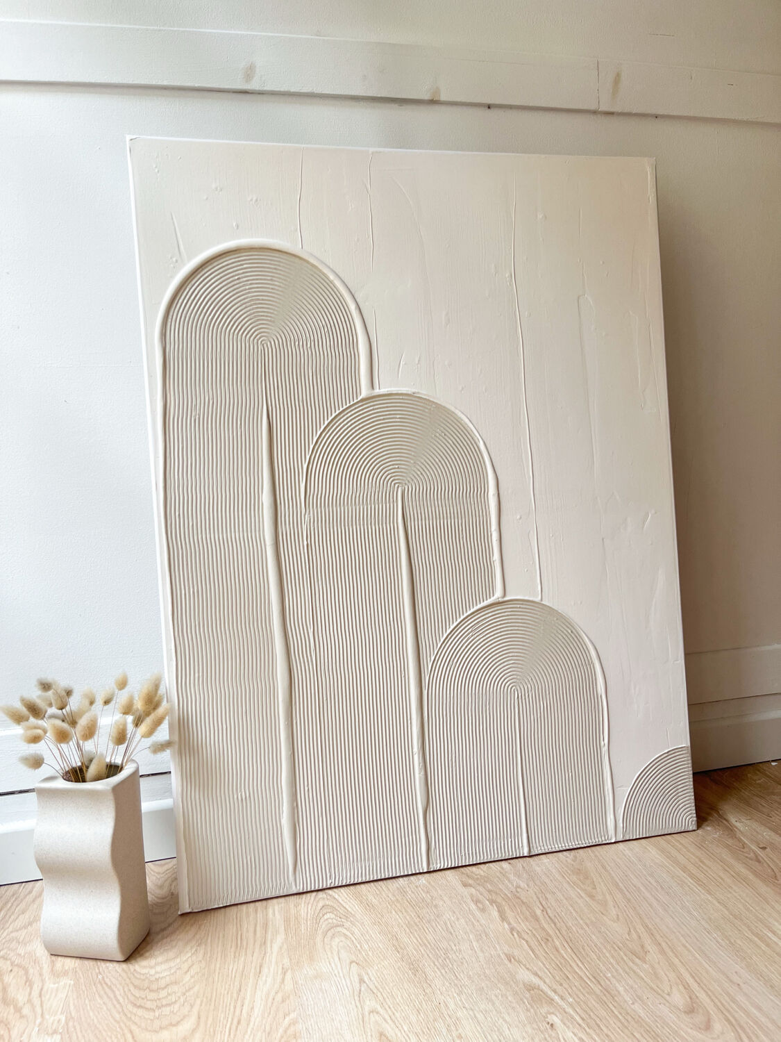 Beige and white relief diptych panels
