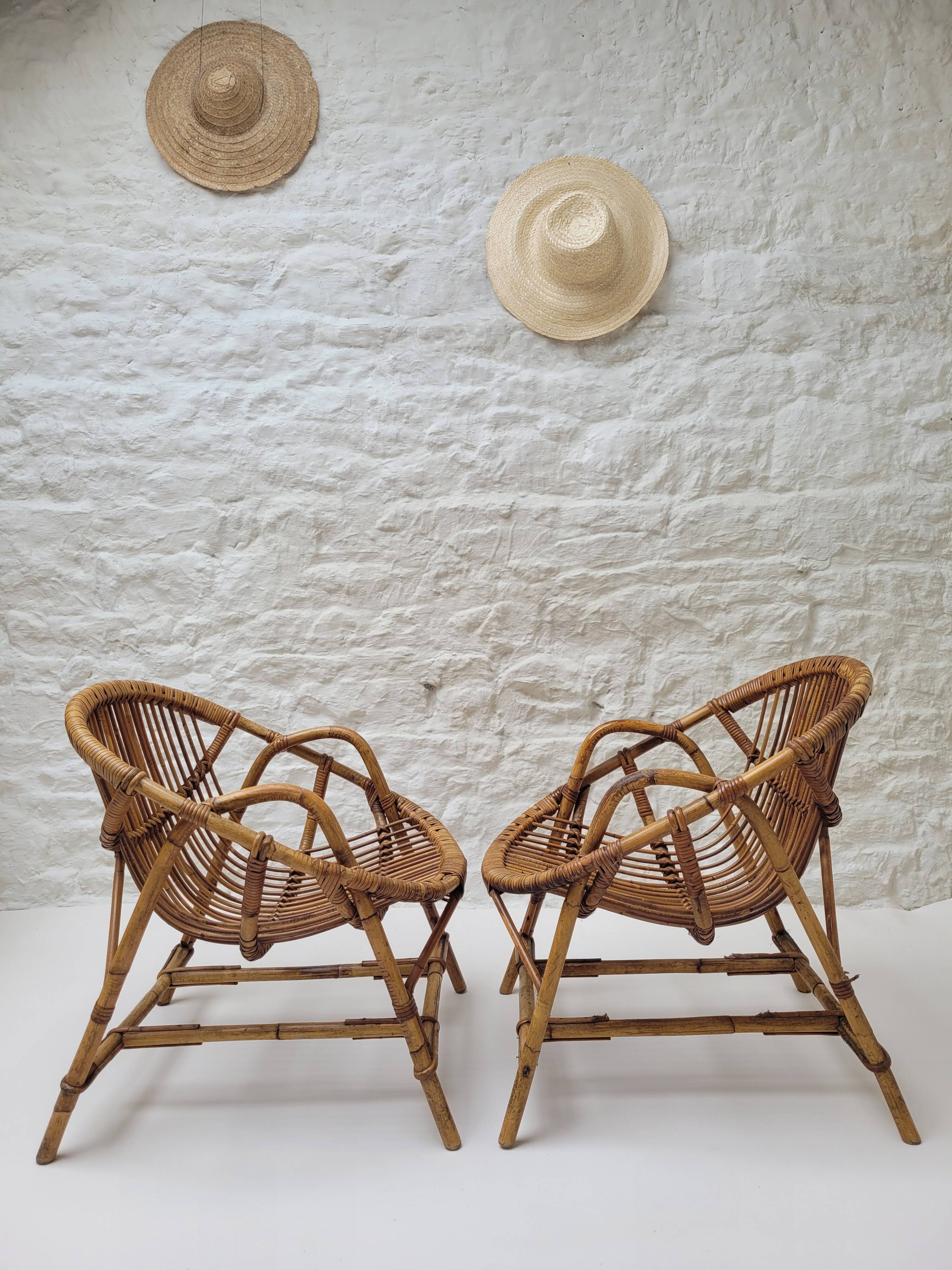 Pair of rattan basket armchairs, 1960s
