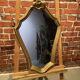 Wooden mirror painted gold