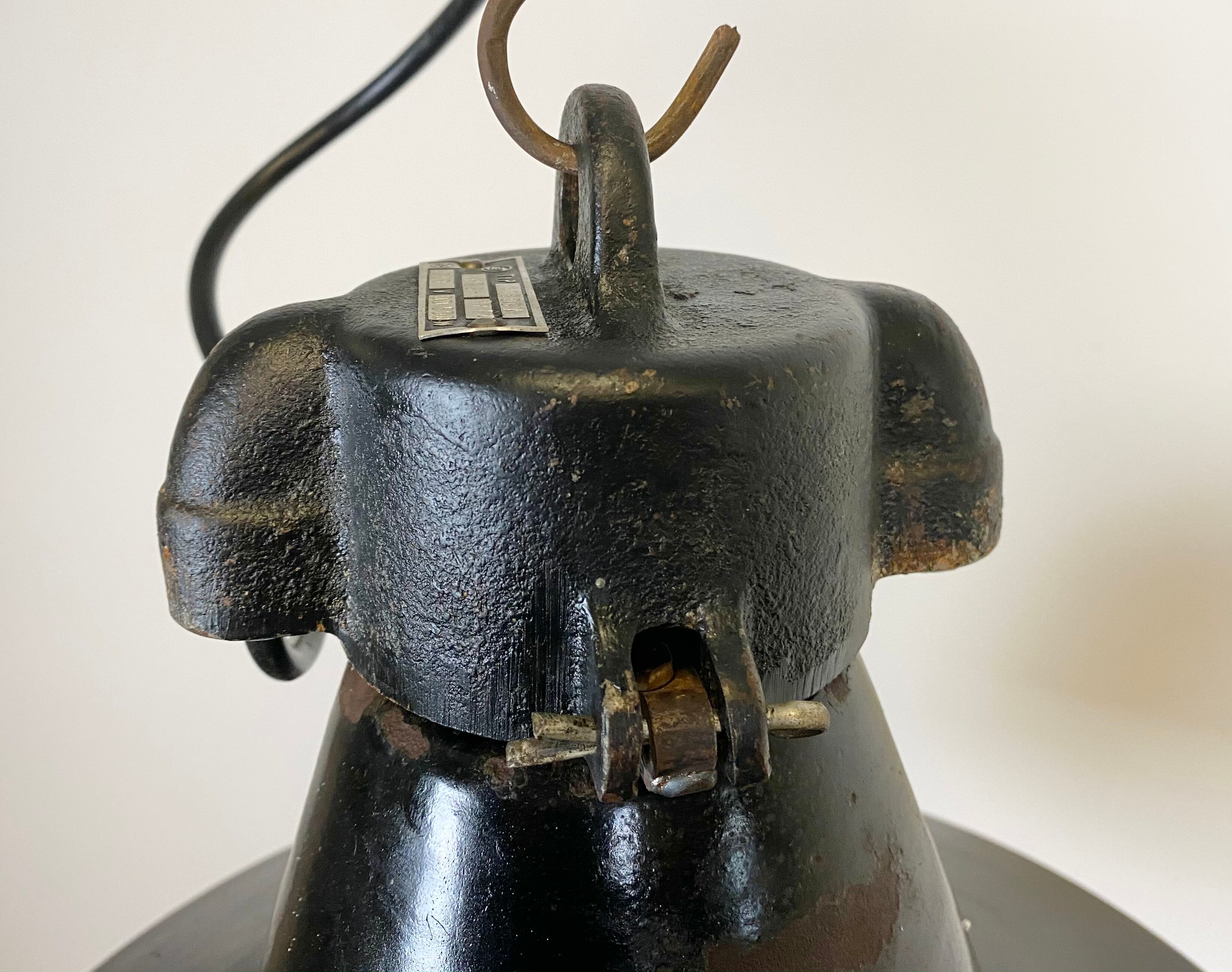 Industrial black enamel pendant lamp with cast iron top, 1970s