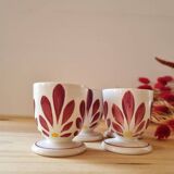 Set of four Digoin-style egg cups