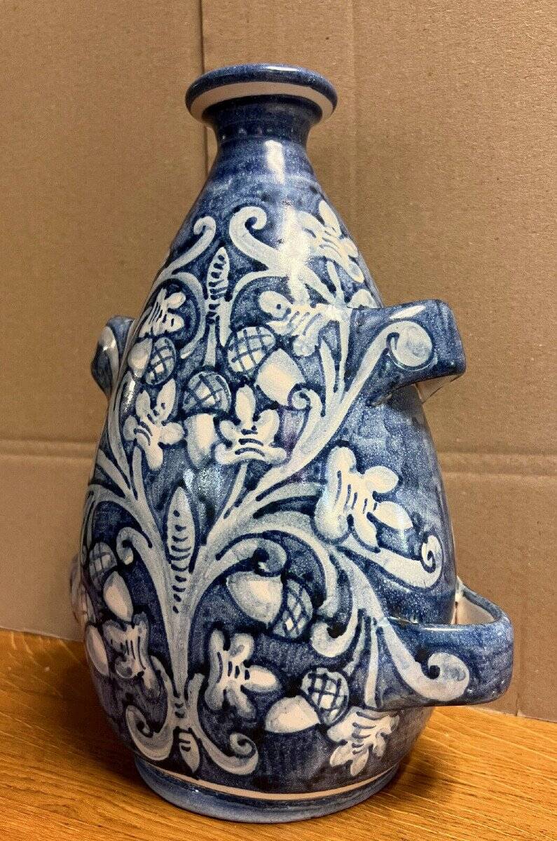 blue and white glazed earthenware vase circa 1900