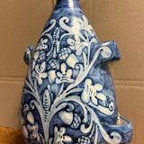 blue and white glazed earthenware vase circa 1900