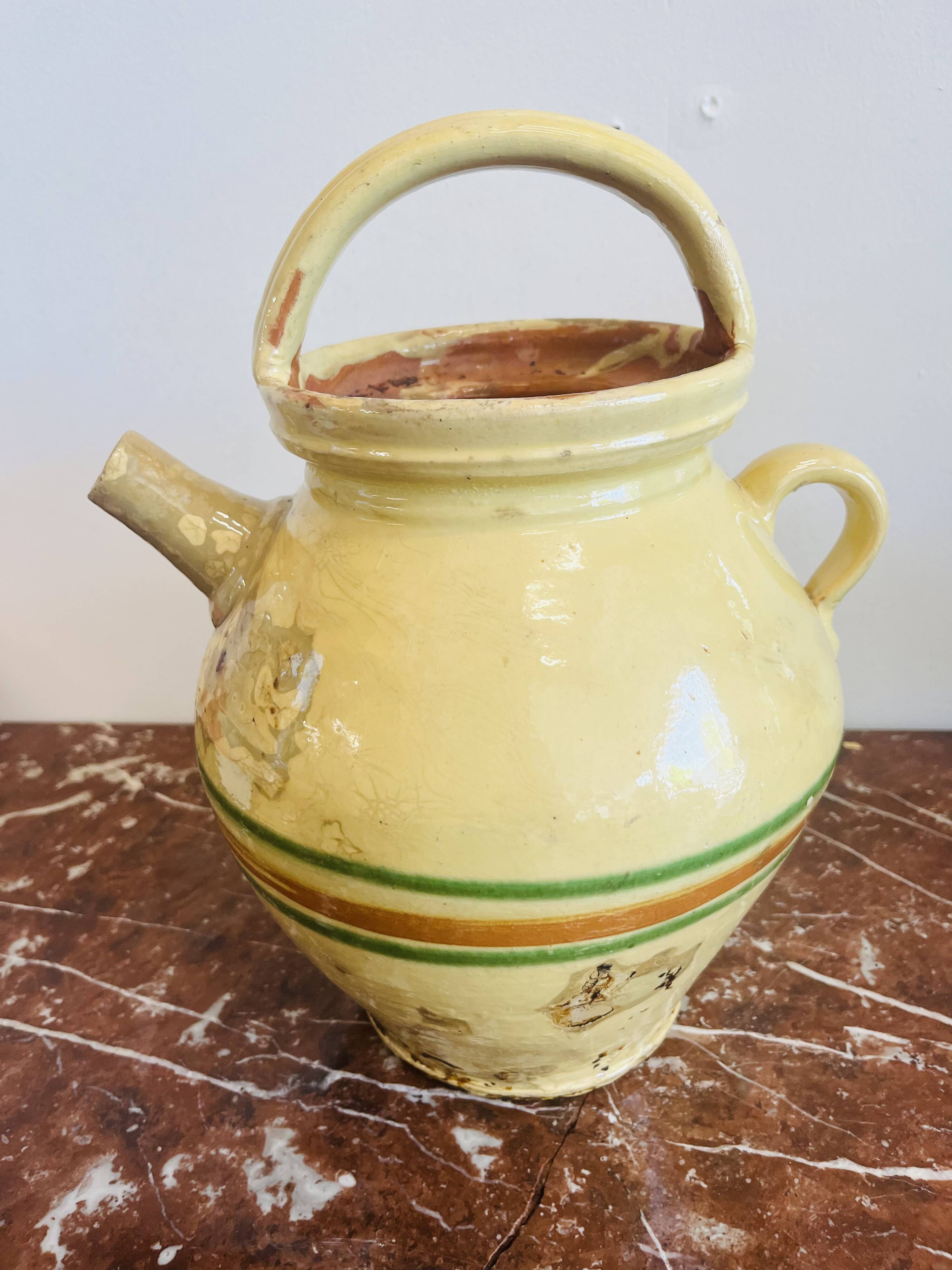Old Savoyard pottery, decorated with orange and green edging