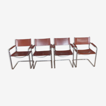 4 design armchairs with chrome tubular base and brown leather seats