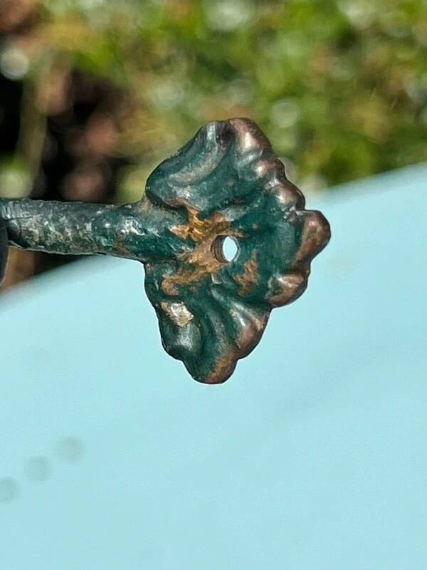 Antique candlestick base – stylised marine fish in patinated bronze