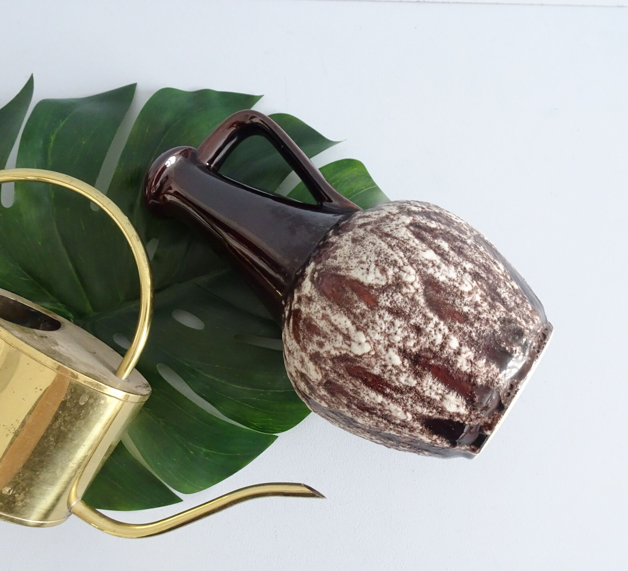 Bay ceramic pitcher with handle and fat lava glaze