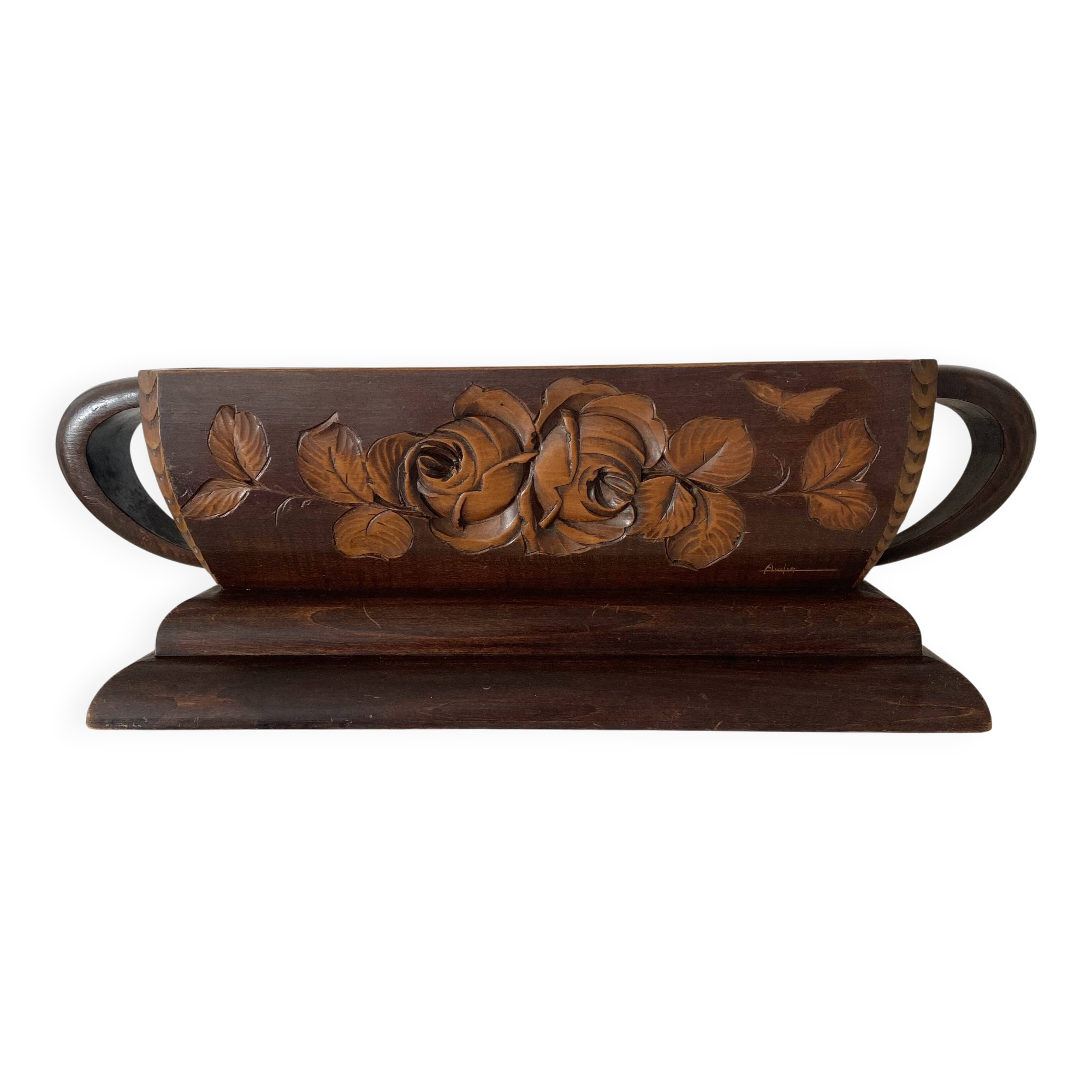 Art Deco jardinière in carved wood, decorated with roses.