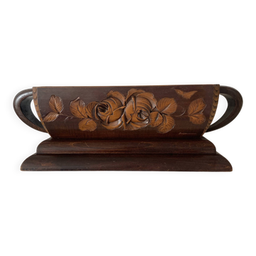Art Deco jardinière in carved wood, decorated with roses.
