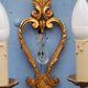 French antique Louis XV style twin arm wall sconces in bronze with crystals.