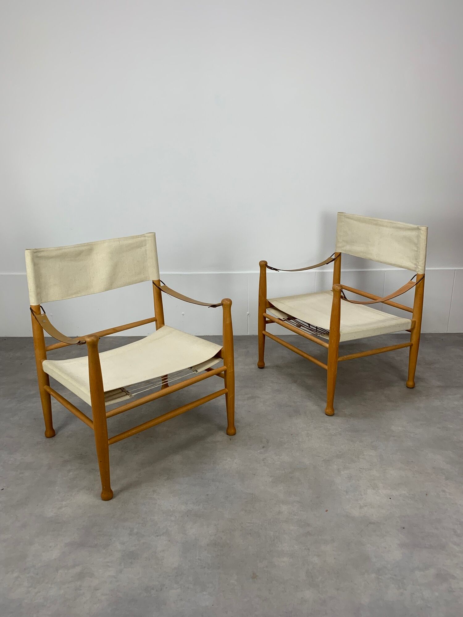 Pair of safari armchairs canvas and leather stretched