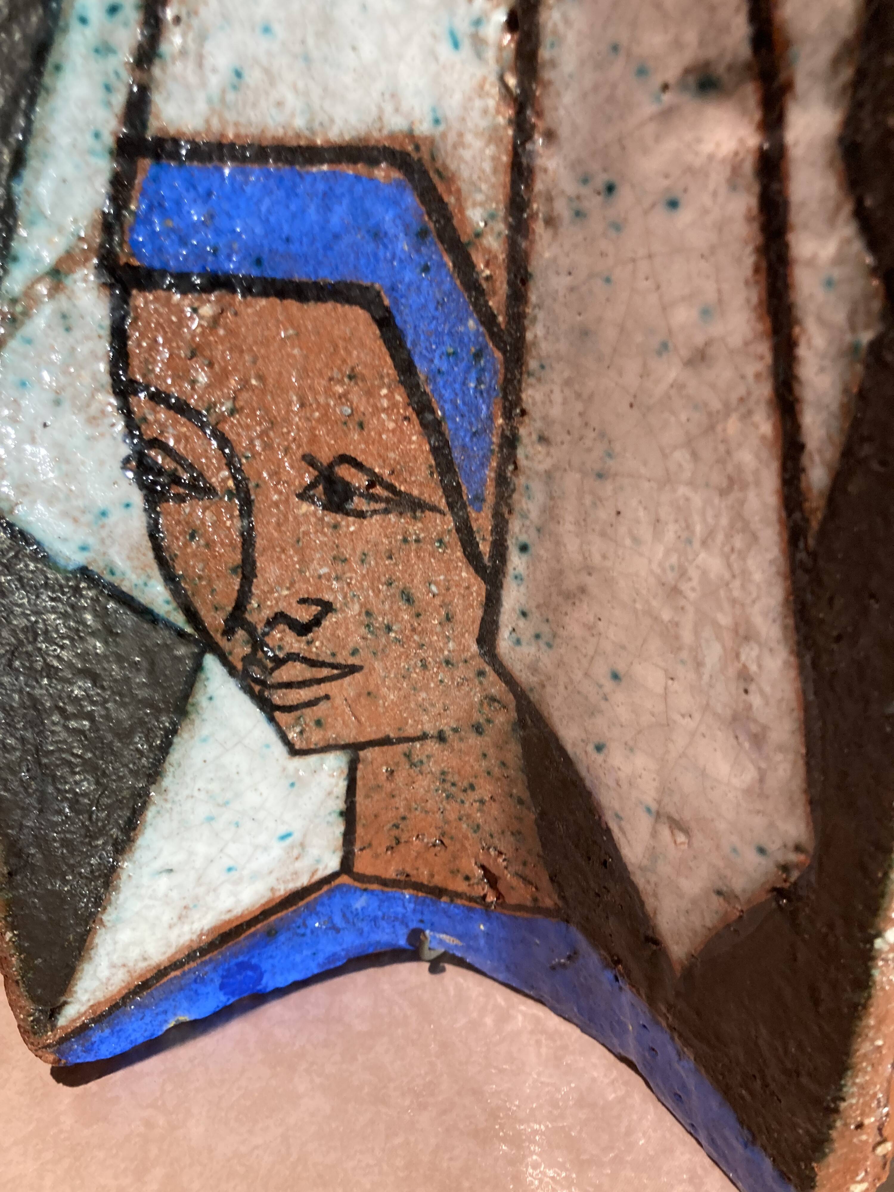 Terracotta tile with enamel decoration of a lady of the high nobility signed OGD