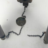 Classic lampshade on antique surveyor tripod