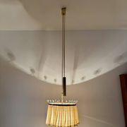 Suspension réglable avec contrepoids par Vereinigte Werkstätten München