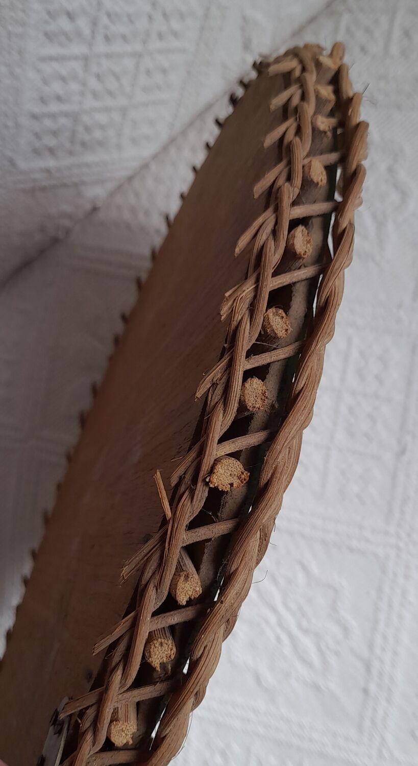 Old vintage braided rattan mirror