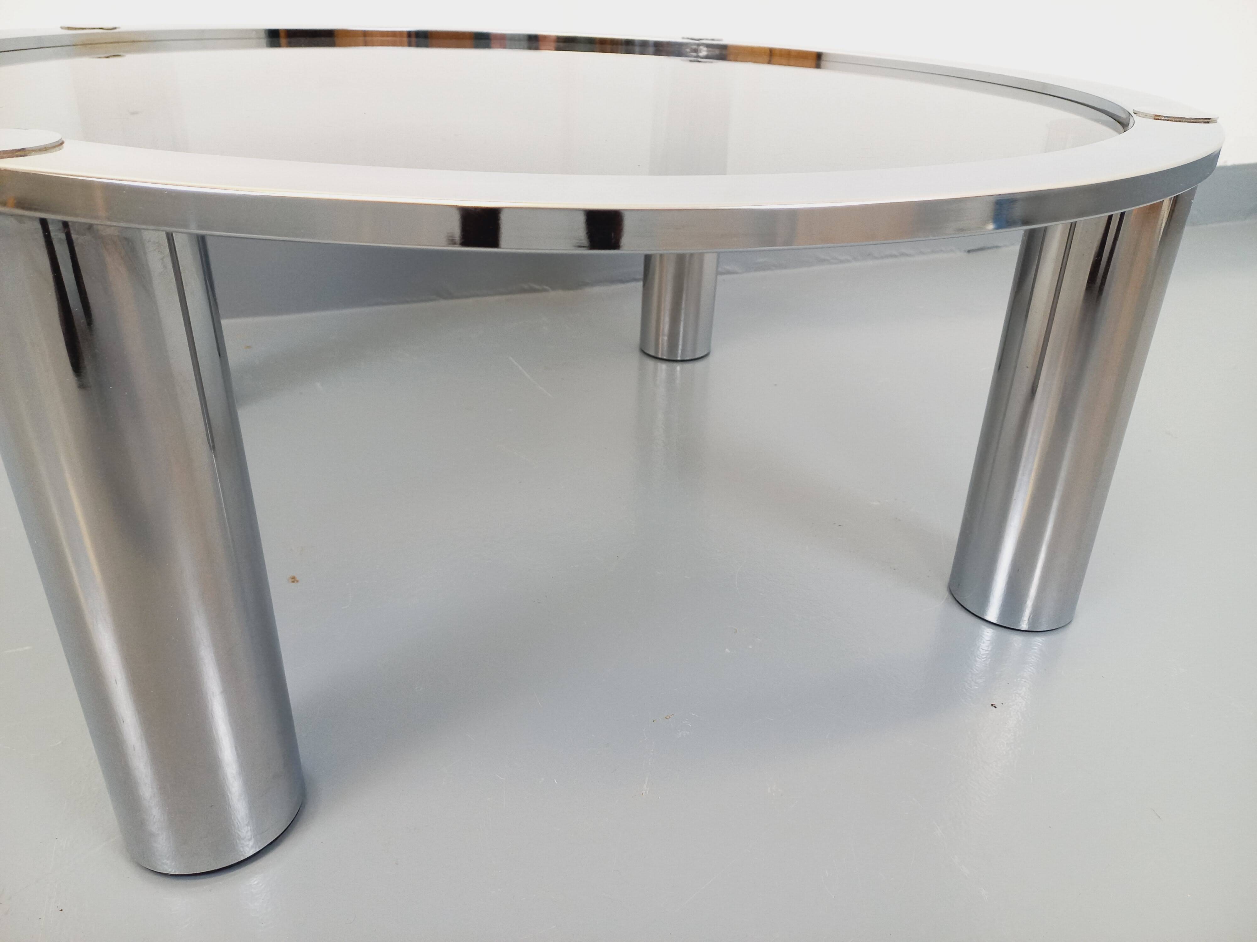 Vintage round coffee table in smoked glass and chrome metal from the 70s