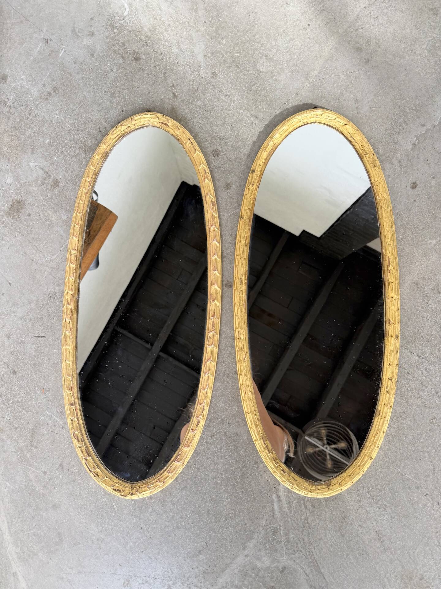 Pair of oval mirrors 1900 gilded stucco