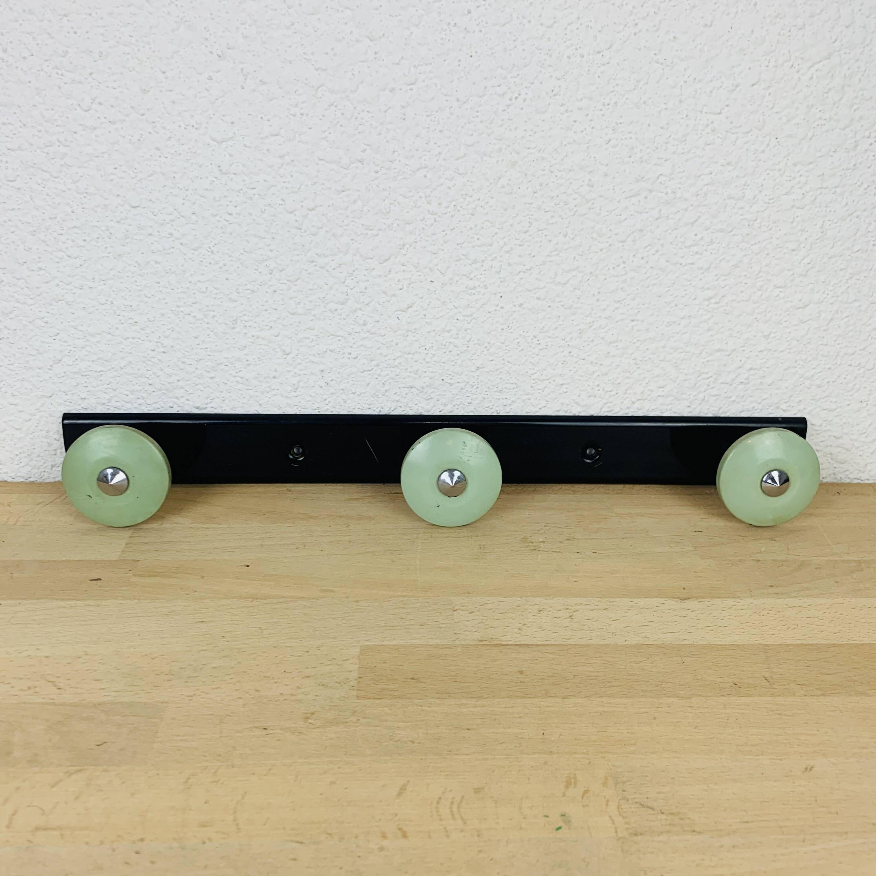 Wall coat rack with 3 hooks from the 1950s