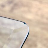 Glass and rattan coffee table