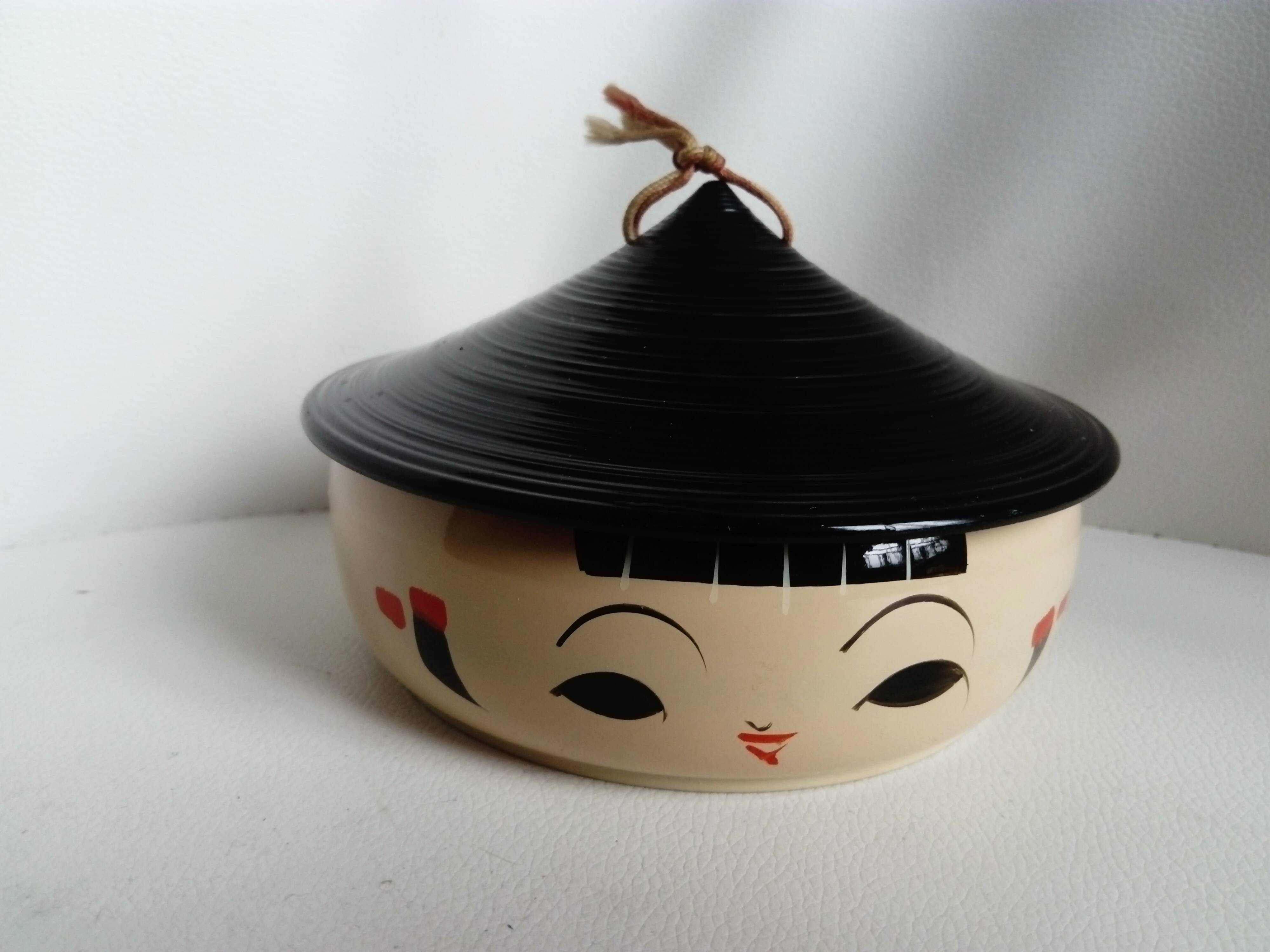 Vintage covered box in the shape of a kokeshi.Japan