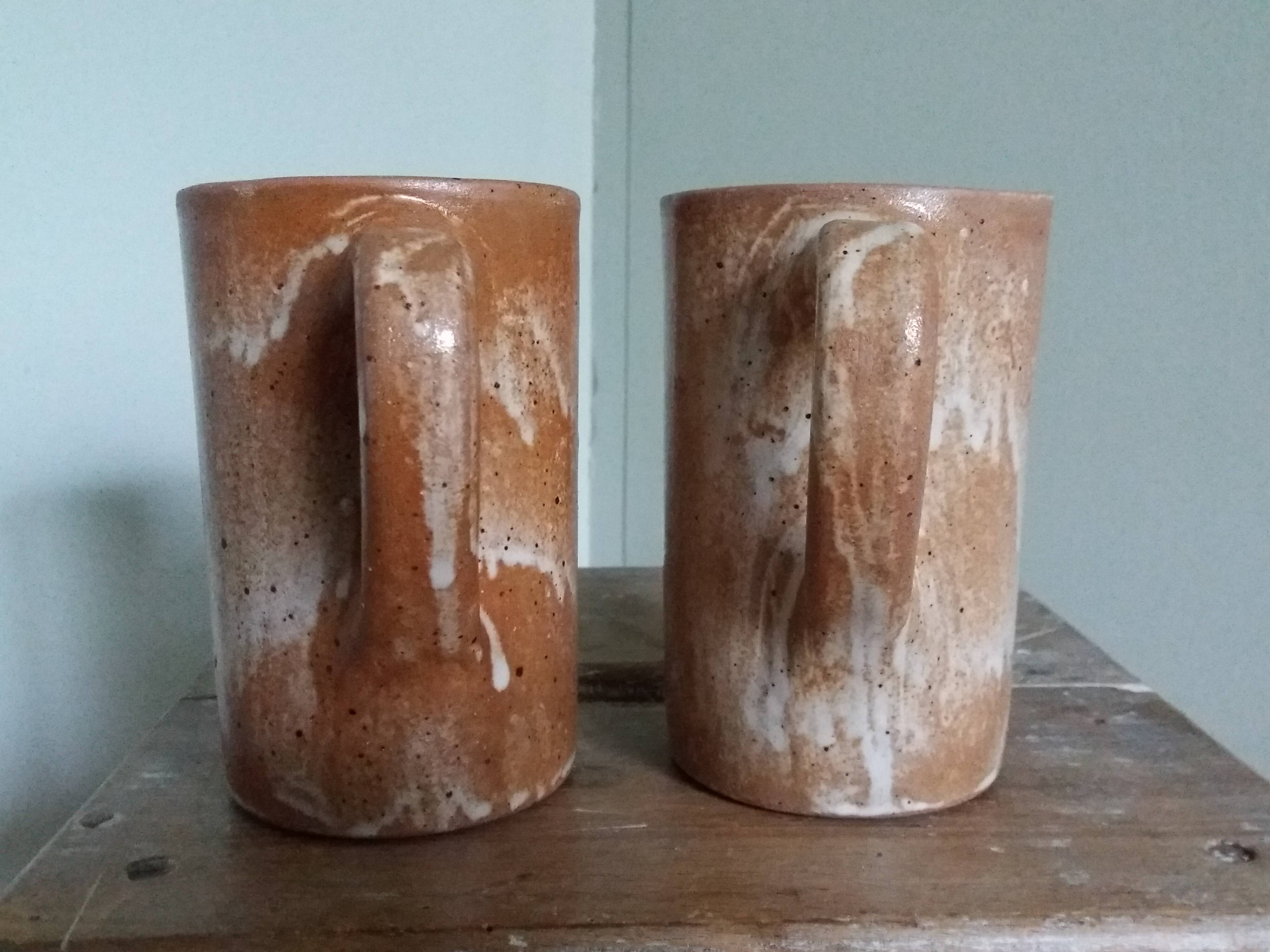 Enamelled stoneware mugs
