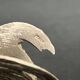 Showcase objects, two 20th century metal rooster and hen subjects