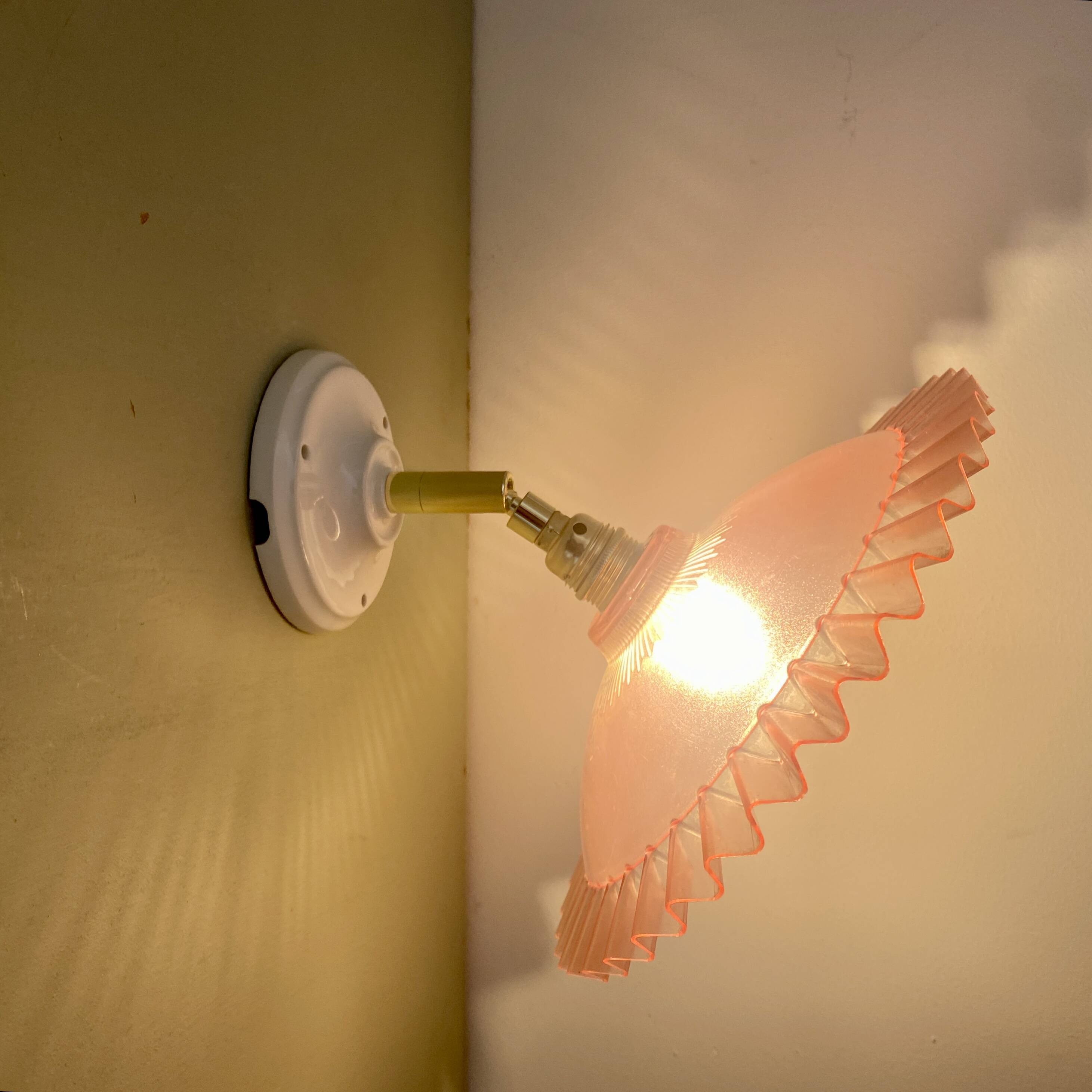 Vintage pink plastic lampshade wall light
