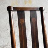 Dark brown solid wood Arts & Crafts armchair with natural rush seat and high back