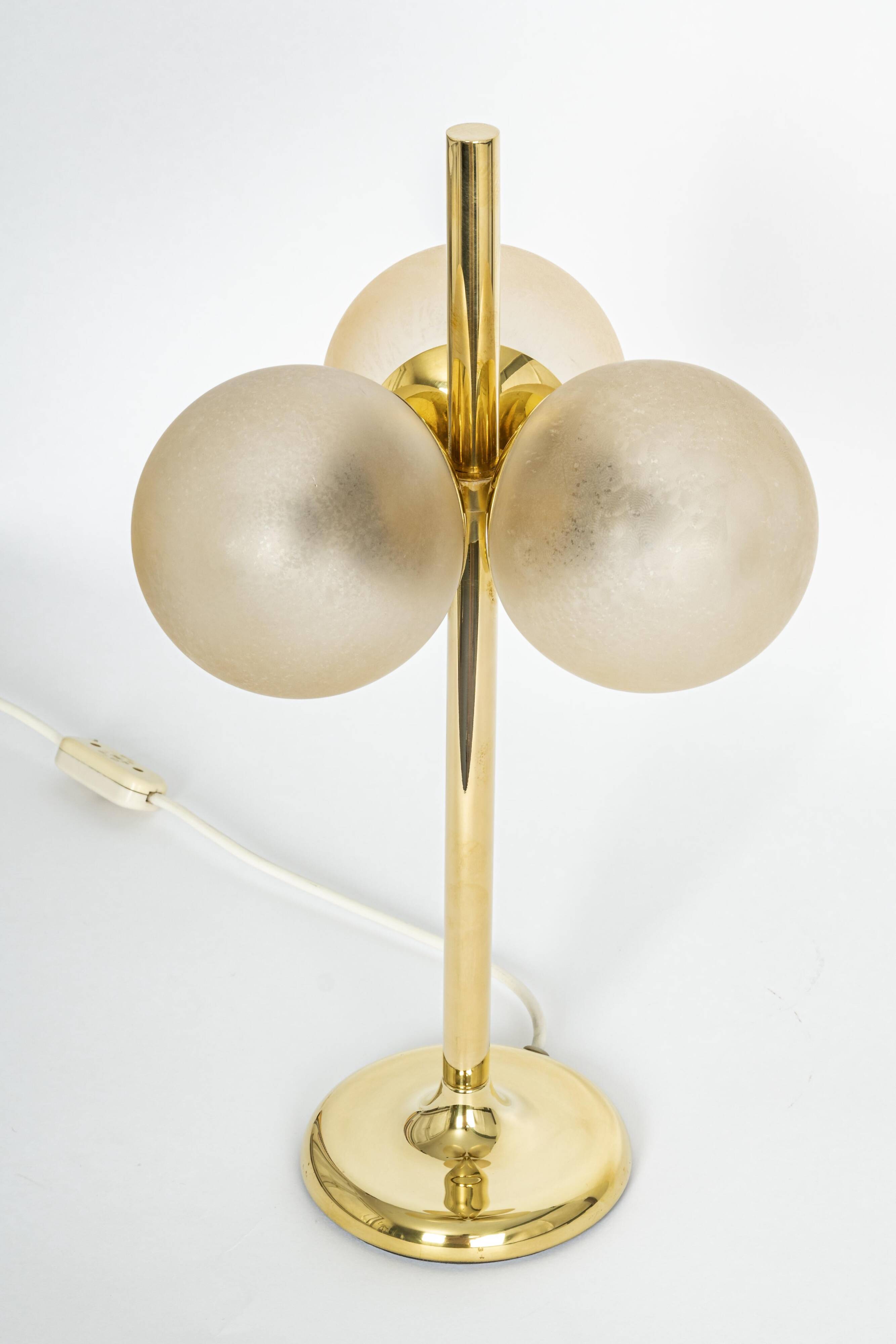 Pair of large brass table lamps by Kaiser, Germany, 1970s.