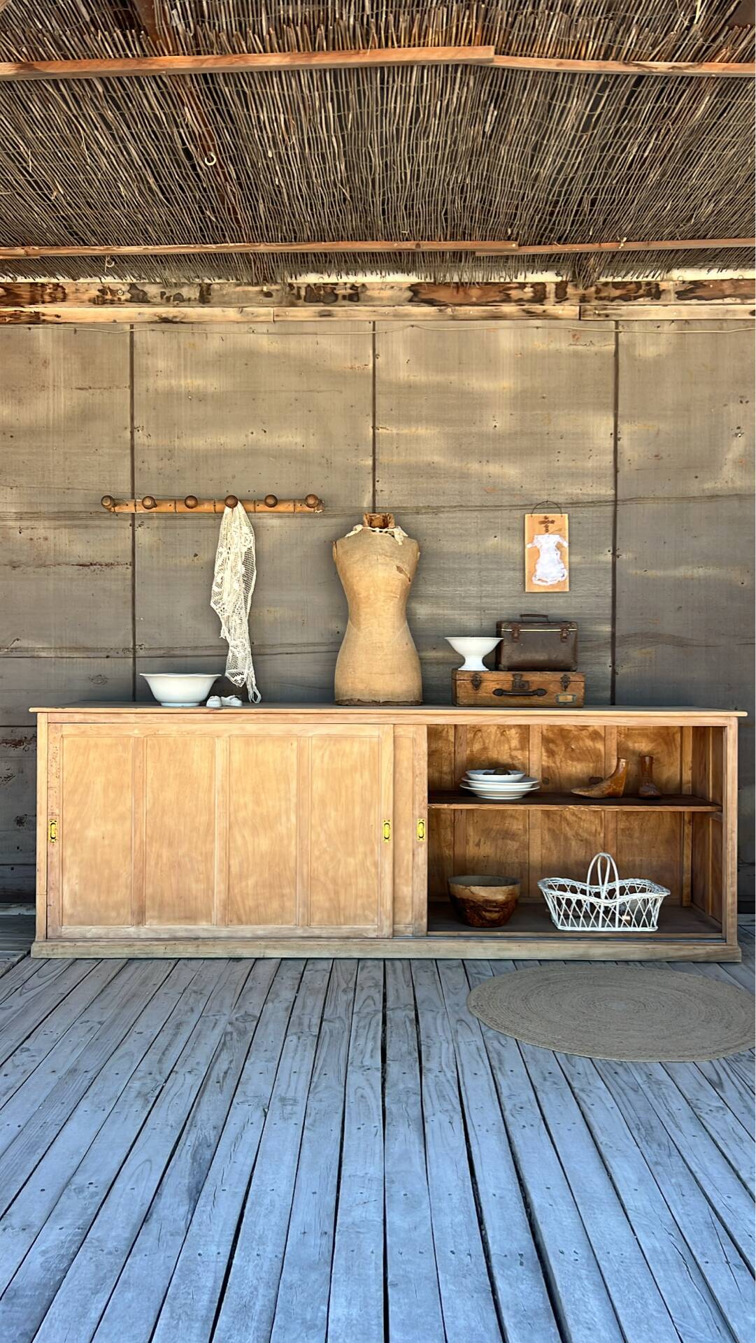 Old counter with sliding doors in raw wood