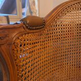 Louis XV style caned armchair